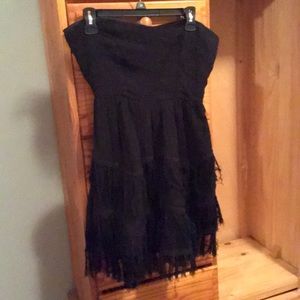 Strapless black dress with fringe bottom
